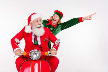 Poster - Portrait of attractive cheerful two people riding scooter showing dream copy space December winter isolated over white color background