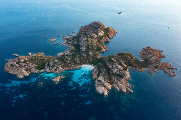 Sticker - View from above, stunning aerial view of Mortorio island with a beautiful white sand beach and a boat floating on a turquoise water. Sardinia, Italy.