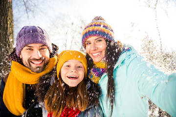 Sticker - Photo of excited lovely family do selfie wear winter cloth outside walk in park