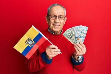 Poster - Handsome senior man with grey hair holding ecuador flag and dollars smiling with a happy and cool smile on face. showing teeth.