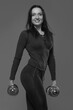 © zhagunov_a - Athletic young woman doing workout with weights
