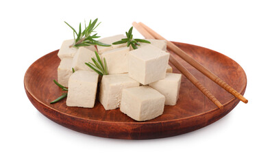 Wooden plate with delicious tofu, rosemary and chopsticks isolated on white