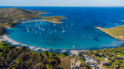 Wall Mural - Aerial view of the bay of Rondinara in the South of Corsica, France - Sandy beach in the shape of a seashell with turquoise waters in the Mediterranean Sea