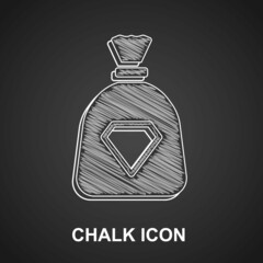 Poster - chalk bag with gems icon isolated on black background. vector