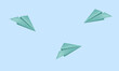 © Faried - blue background image with three paper planes