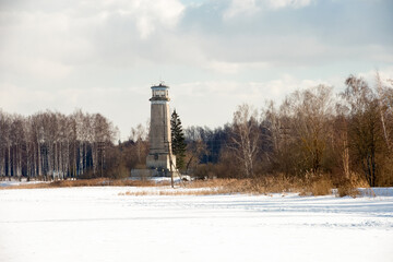 Wall Mural - A view on a winter day at Big Volzhsky lighthouse on the river. Dubna city, Moscow region, Russia.