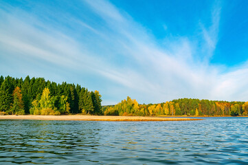 Wall Mural - panoramic view of the bright colorful trees along the bank of the kama river russia perm krai. autum