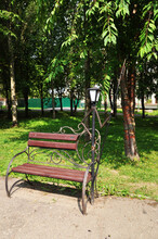 Beautiful Park Bench With A Lantern. Park Decoration, Bench Decoration. Background, Design.  . 02 August 2021, Smolensk, Russia.