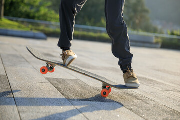 Wall Mural - Skateboarder skateboarding outdoors in city