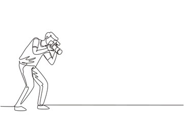 Wall Mural - Single continuous line drawing funny professional photographer with camera taking photo with pose. Photographer character with camera digital. Dynamic one line draw graphic design vector illustration