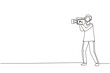 Continuous one line drawing professional camera operator holding big camera on shoulder. Arabian cameraman, reporter shooting TV content. Videographer job. Single line draw design vector illustration