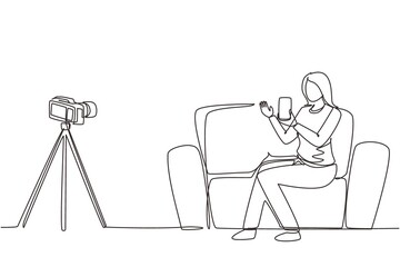 Poster - Single one line drawing female influencer filming video review smartphone on dslr camera at home. Blogger advertising tech product, streaming live. Continuous line draw design vector illustration