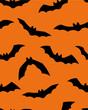 Seamless vector halloween pattern with black bats, wallpaper, cover. Holiday wrapping paper.