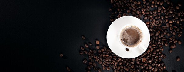 Cup of coffee on dark background