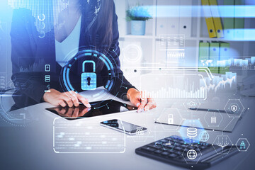 Poster - Businesswoman wearing formal suit is typing message on tablet