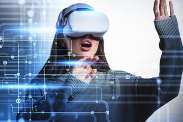 Poster - Businesswoman in grey sweater is wearing vr helmet