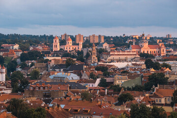 Wall Mural - VIlnius / Lithuania - August 12 2021: View over the Old Town of Vilnius in summer at sunset, amazing baltic touristic city in Lithuania