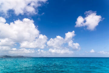 Wall Mural - Seascape Sunny day. Blue sky and blue water.