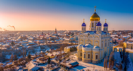 Wall Mural - The main cathedral of the city of Yelets, the Ascension Cathedral, rises above the ancient Russian city on a winter evening during sunset