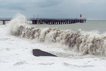 Wall Mural - View of the pier at stormy day time.