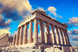 World famous iconic Parthenon on the Acropolis Hill in Athens, Greece with dramatic clouds.