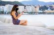 © Eclipsnet - beautiful woman looking the smart phone