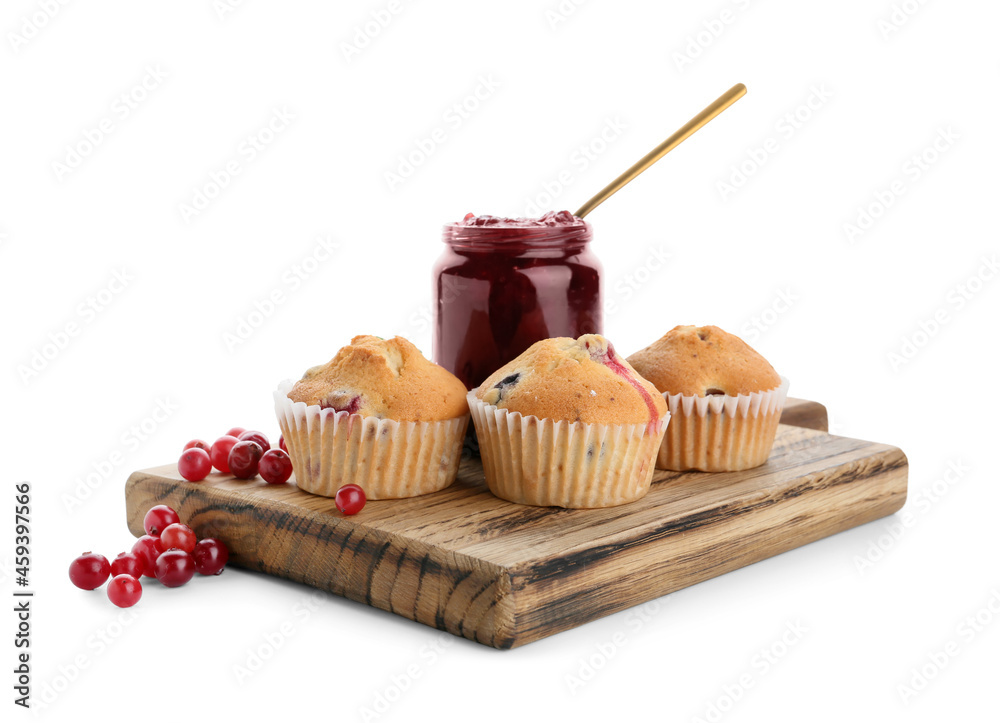 Wooden board with tasty cranberry muffins on white background