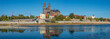 Panoramic view over Magdeburg historical downtown, Elbe river and the cathedral in early Autumn at blue sky and sunny day, Magdeburg, Germany.