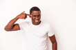 © Asier - Young African American man isolated on white background showing a disappointment gesture with forefinger.