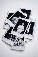 Stack Of Polaroid Photographs On White Background