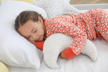 Poster - Cute girl in pajamas sleeping with moon shaped pillow at home