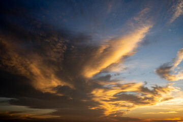 Wall Mural - The clouds with sunlight on the sky background.