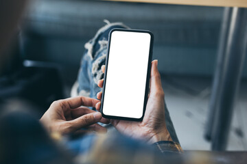 cell phone blank white screen mockup.woman hand holding texting using mobile on desk at office.background empty space for advertise.work people contact marketing business,technology