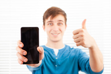 Wall Mural - Young Man with a Phone