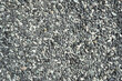 gray gravel stones abstract background. Pebble backdrop. crushed stones, construction rocks texture. top view