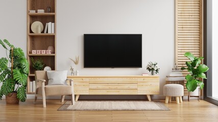 tv cabinet on the white wall in living room with armchair,minimal design.