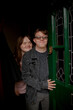 © Anna Neubauer - Young couple with Down Syndrome and Foetal Alcohol Syndrome standing at front door and smiling
