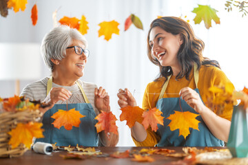 Women doing autumn decor