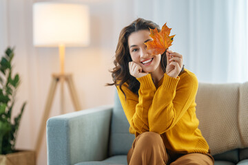 Wall Mural - woman resting on sofa at home
