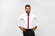 © Тарас Нагирняк - Portrait of young indian top manager in t-shirt and tie on white isolated background
