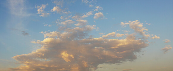 Wall Mural - dramatic late afternoon clouds on the horizon panorama