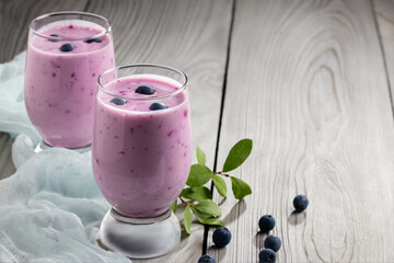 Wall Mural - Homemade blueberry yogurt smoothie. Protein shake with berries. Copyspace