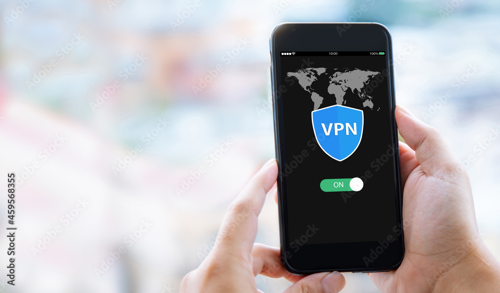 Vpn Using Man Ong VPN Internet protocols private network concept.Man hands holding mobile ...
