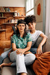 © (JLco) Julia Amaral - Wedded lesbian couple sitting together