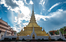 Wat Phra That Chae Hang Temple With Beautiful Sky And Clouds The Most Important Temple In Nan Province Of Thailand. The Chedi Contains A Relic Of The Buddha Dating Back To 14th Century.