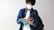 © mangpor2004 - Young asian campus student man wearing protection mask while online study digital tablet in campus, coronavirus prevention in university, social distancing, online learning