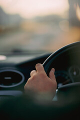 Wall Mural - driving a convertible car during a summer sunset time