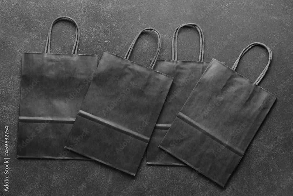 Shopping bags on dark background. Black Friday sale