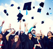 © Rawpixel.com - Graduating students throwing hats in the air