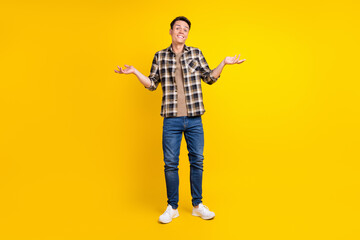 Sticker - Photo of clueless uncertain guy shrug shoulders wear plaid shirt jeans shoes isolated yellow color background